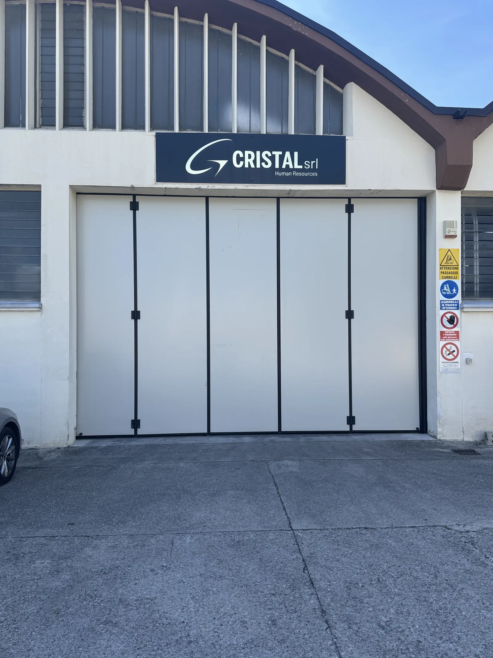 The front of the Cristal warehouse in Maron di Brugnera, with the sign above the main door